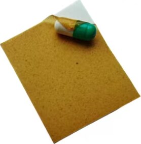 A capsule placed on a pill wrap sheet